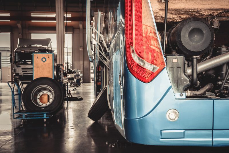 Coach in mechanic workshop